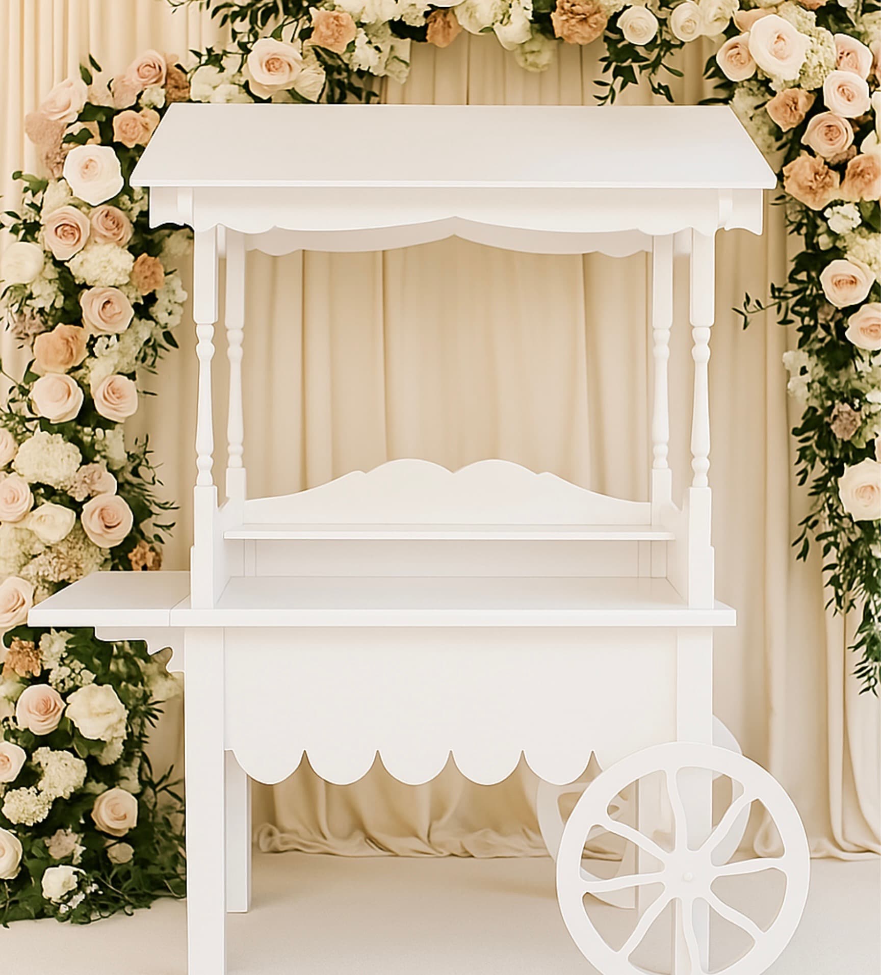 Peter Rabbit-themed dessert cart outdoors under a tree, styled with a pastel floral arrangement, a storybook and 'A Little Bunny Is on the Way' signage